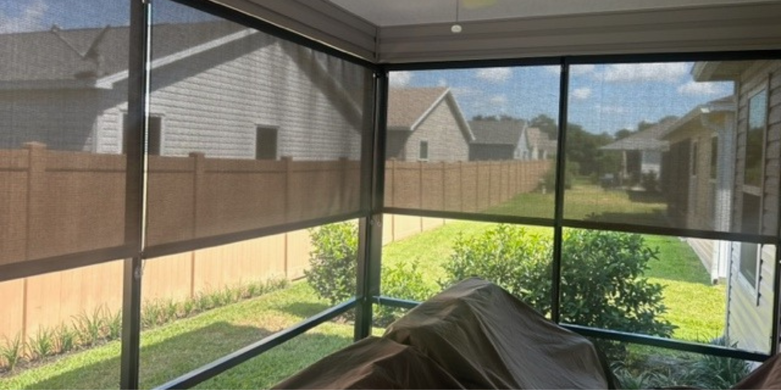Custom Solar Shades in Orlando, FL installed on an outdoor patio for sun control